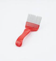 Uncapping Comb